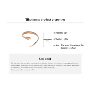 Detail view of rose gold oval open bangle showing dimensions 5.5cm inner diameter