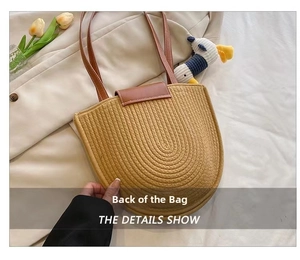 Detail showing the back view of a semi-circular woven cotton beach bag with leather straps