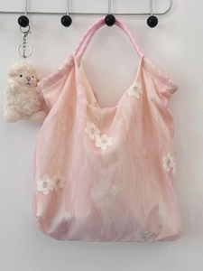 Pink tie-dye tulle tote bag with white lace floral embroidery and plush sheep charm
