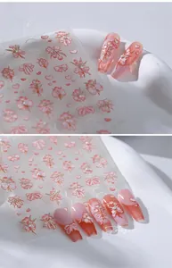 Detailed 5D embossed butterfly and flower nail art stickers with pearl accents