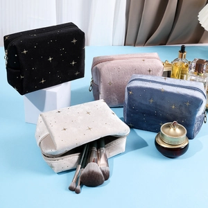Velvet star pattern cosmetic bags in black pink blue and beige with zipper closure