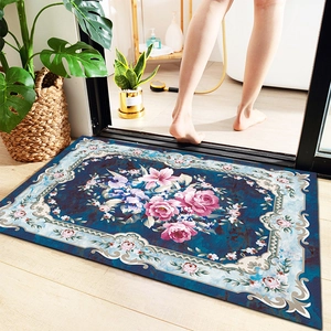 Absorbent floral bathroom mat with classical pink flower design on navy blue background