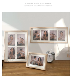 Dettaglio di cornici portafoto minimaliste in legno chiaro con passepartout multiplo