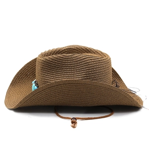 Detailed side view of dark brown woven straw cowboy hat with turquoise beads and chin strap