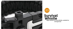 Detail view of survival whistle and buckle on black paracord survival bracelet