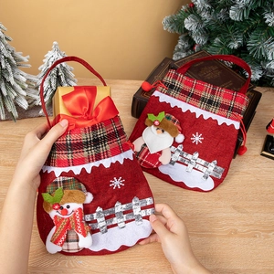 Christmas gift bags with 3D snowman and Santa Claus designs for holiday apple packaging