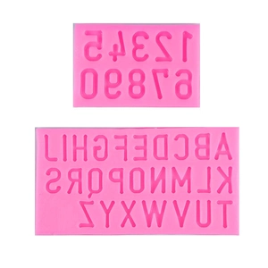 Pink silicone number and uppercase letter molds for DIY chocolate or cake decoration