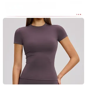 Detail view of slim-fit purple sports T-shirt featuring a contouring waist-shaping cut