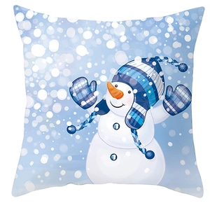 Blue Christmas throw pillow cover featuring festive snowman and snowflake patterns