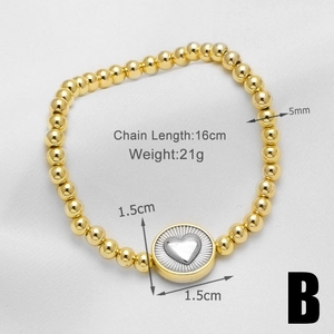 Detail showing 18k gold beaded bracelet with heart pendant and 16cm circumference specs