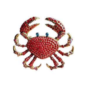 Luxury gold crab brooch with red rhinestones and blue eyes for women's fashion coats