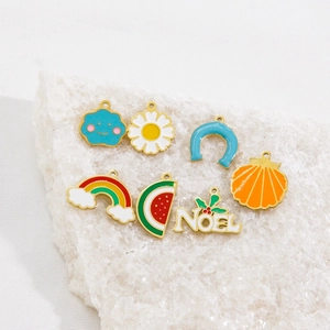 Colorful enamel 14K gold plated stainless steel charms in rainbow and floral designs