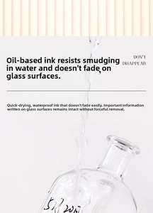 Waterproof and quick-dry oil-based marker pen writing on a smooth glass surface