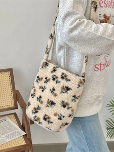 Floral lamb wool tote bag in off-white plush fabric for winter casual styling
