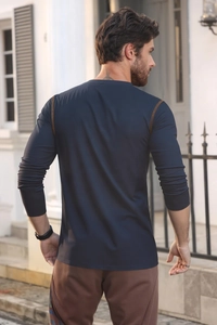 Rear view of men's navy long sleeve polo shirt with brown contrast stitching on shoulders