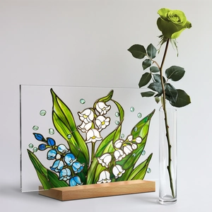 Macro shot of lily of the valley acrylic plaque with a solid wood base for desk decor