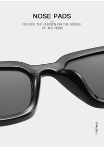Detailed close-up of integrated nose pads on premium black cat-eye sunglasses