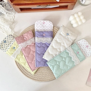 Quilted heart pattern soft fabric glasses pouches in various pastel colors with lace trim