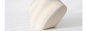 Detailed close-up of beige linen jewelry neck display stand with elegant texture