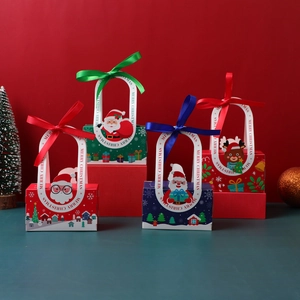 Set of 4 Christmas gift boxes with Santa and Reindeer patterns and ribbon handles