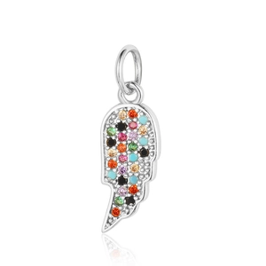 Close-up of silver wing pendant with colorful gemstones and clear reflection