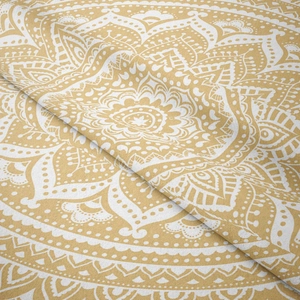 Detailed macro view of yellow bohemian mandala tapestry with intricate geometric floral weave