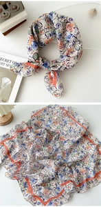 Detailed views of floral cotton linen square scarf with orange borders and silk texture