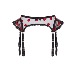 Detail of lace garter belt with red polka dots, black ribbon bow and adjustable straps