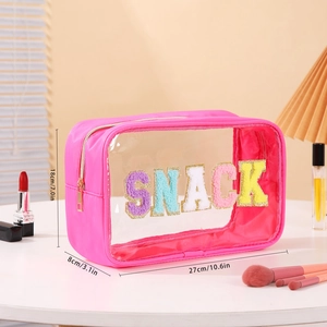 Pink PVC toiletry bag dimensions showing 27x8x18cm size and colorful SNACK embroidery