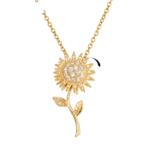 Rotating golden sunflower pendant necklace with sparkling zircons on a delicate cross chain