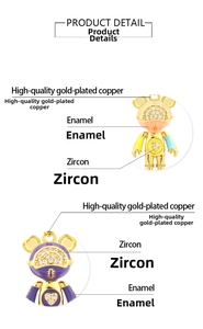 Macro view of 18K gold plated bear pendant with enamel finish and zircon inlay