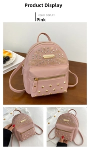 Pink mini backpack with gold rivets and rhinestones shown on a wooden background