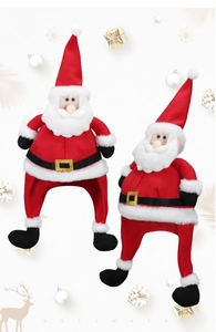 Detail of red velvet Santa Claus chair leg covers with white fur trim and belt accents