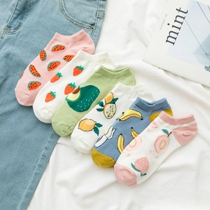 Flat lay of six pairs of cotton ankle socks with cute fruit patterns and ribbed cuffs
