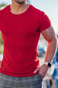 Detail of red slim fit men's T-shirt showing ribbed texture and short sleeve design