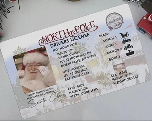 Close-up of a Santa Claus North Pole Sleigh Drivers License card for kids gift
