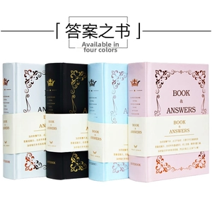 Detailed view of embossed floral covers and gold foil crown on four-color answer books