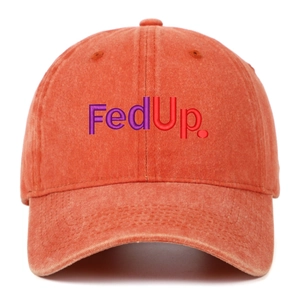 Macro detail of the vintage washed orange cotton fabric and FedUp embroidery on the cap