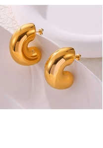 Detailed close-up of 18K gold plated C-shape earrings with a polished metallic finish