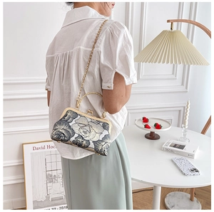 Retro black jacquard floral qipao evening bag with gold metal handle and chain strap