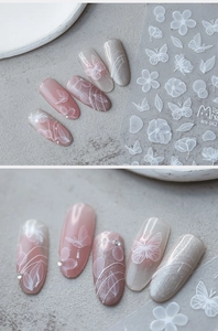 Dettaglio macro degli adesivi Miss Nail MN-062 con motivi a farfalla e fiori traslucidi