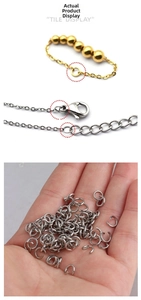 Detail showing gold lobster clasps and stainless steel open jump rings for DIY jewelry
