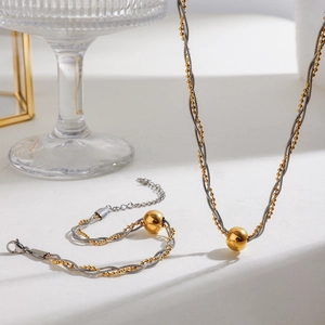 Dual-tone gold and silver beaded multi-layer necklace and bracelet jewelry set