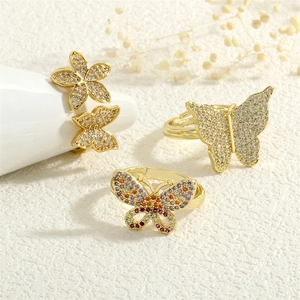 Adjustable 18K gold butterfly rings with sparkling clear and colored cubic zirconia