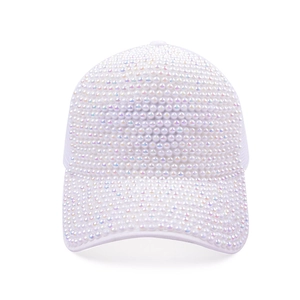 Close-up of white baseball cap with full pearl bead decorations and mesh back structure