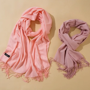 Classic pink cashmere blend long scarves with fringe and brand label for autumn winter