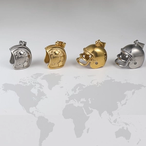 Rugby helmet pendants in gold and silver finish with embossed star details