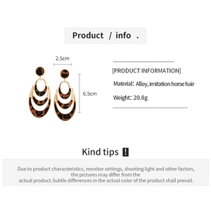 Detailed size specifications and material info for leopard print layered hoop earrings