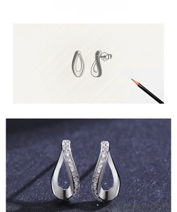 Macro view of S925 sterling silver Mobius stud earrings with micro-set zircons