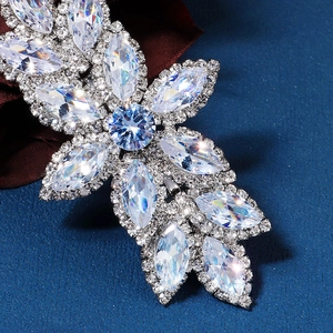 Sparkling crystal flower spring hair clip with marquise cut stones on a textured base